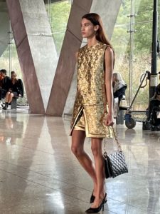 Perot – Embossed gold dress, paired with embossed handbag. Photo by Courtney Dabney.