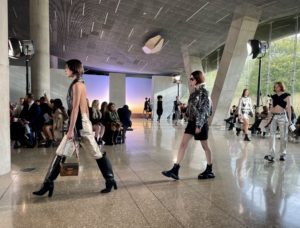 Perot – Sequined pashminas and bomber jackts capture the light. Photo by Courtney Dabney.