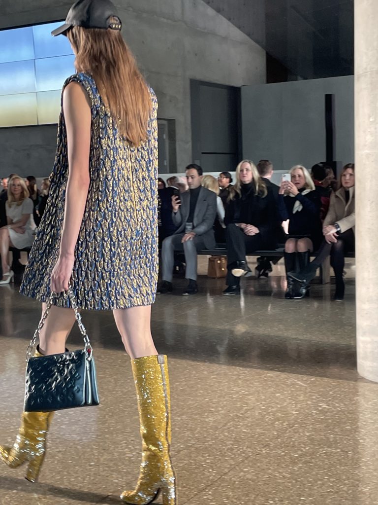 Yellow sequined boots pop on the runway. Photo by Courtney Dabney.