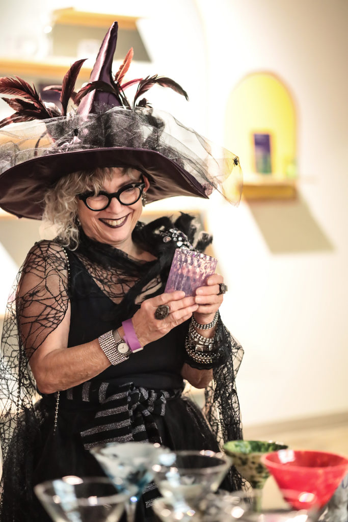 Sandie Zilker chooses a glass at Houston Center for Contemporary Craft Martini Madness (Photo by Katy Anderson)