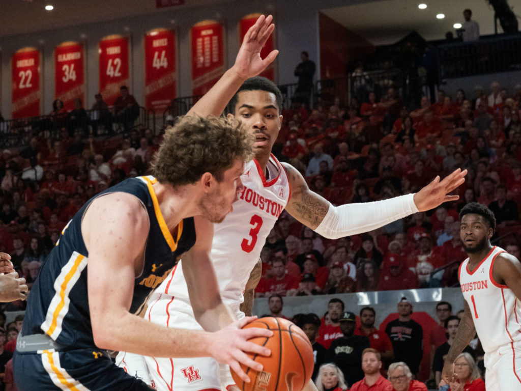 UH's Ramon Walker Jr. just keeps finding a way to make an impact, whether playing guard or undersized power forward. (Photo by F. Carter Smith)