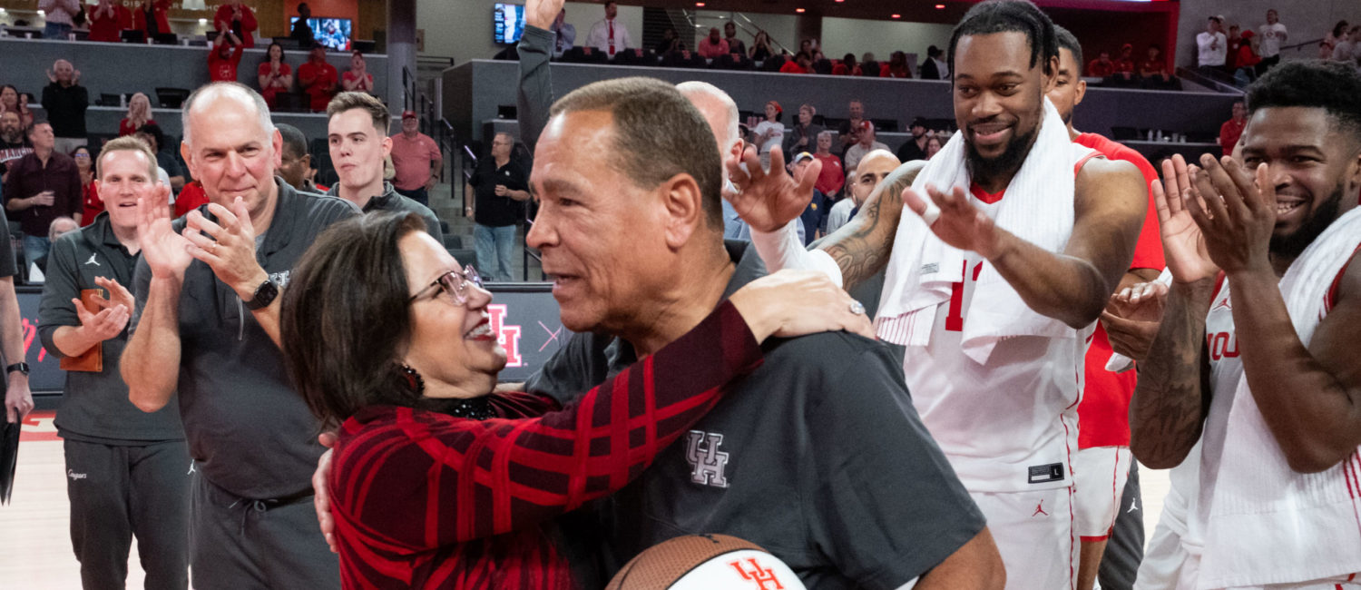 Karen Sampson had a big hug for her husband, University of Houston coach Kelvin Sampson, after he reached 700 wins. (Photo by F. Carter Smith)