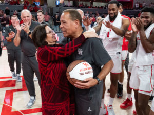 Karen Sampson had a big hug for her husband, University of Houston coach Kelvin Sampson, after he reached 700 wins. (Photo by F. Carter Smith)