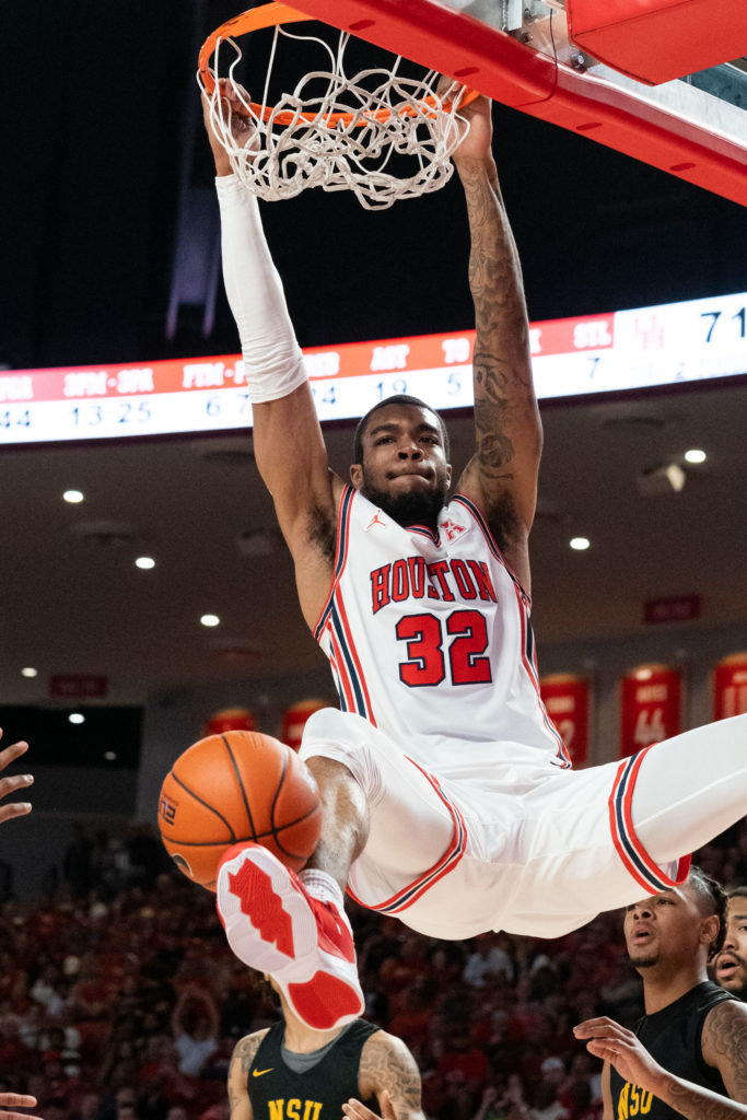 UH senior forward Reggie Chaney threw down a dunk after teammate J'Wan Roberts' unselfish pass. (Photo by F. Carter Smith)