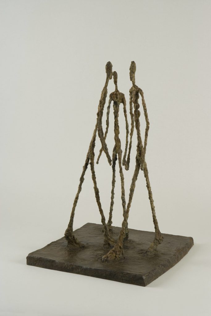 Alberto Giacometti, Three Men Walking, c. 1948, bronze, Fondation Giacometti. Succession Alberto Giacometti/ADAGP, Paris, 2022.