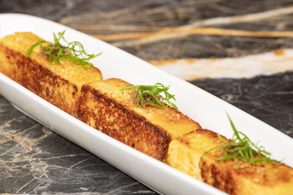 Truffle 'Twinkies' with egg yolk custard, truffle, and fried brioche at The Lymbar. (Photo by Dylan McEwan)