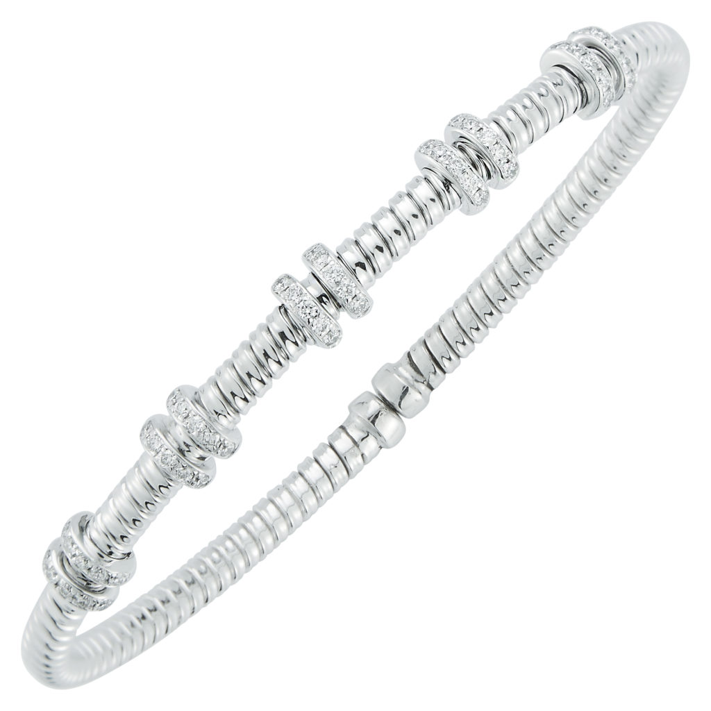Fallon B 18K white gold rhodium plated diamond station bangle bracelet with round diamonds weighing 0.35 carat total weight; $3,100