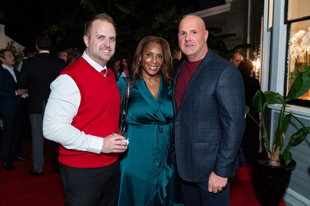 Benjamin Stewart, Dr. Vernicka Sales, Billy Addock at Legacy Community Health's Holiday Schmooze. (Photo by Killy Chavez)
