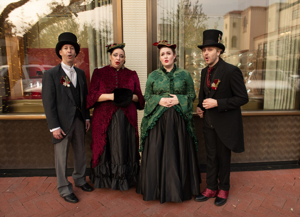 The Uptown Carolers sang there way through Highland Park Village.  (Photo by George Fiala)