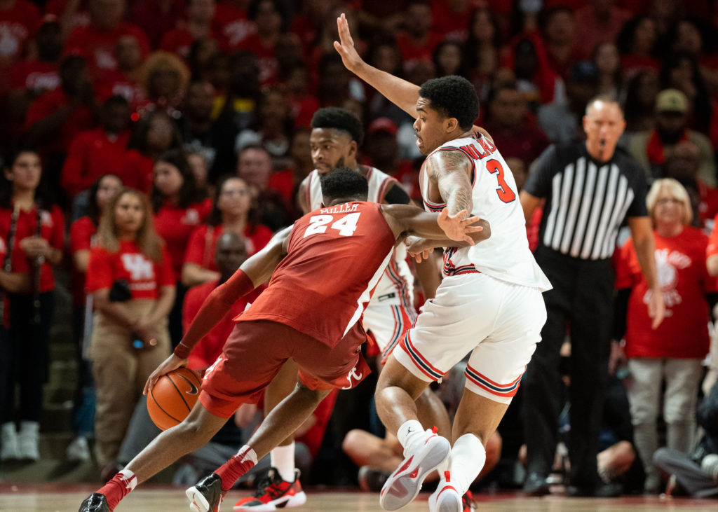 UH guard Ramon Walker Jr. helped hold Alabama super freshman Brandon Miller in check. (Photo by F. Carter Smith)