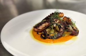 Cowboy Prime – will feature wagyu steaks and prime seafood like this grilled octopus dish.