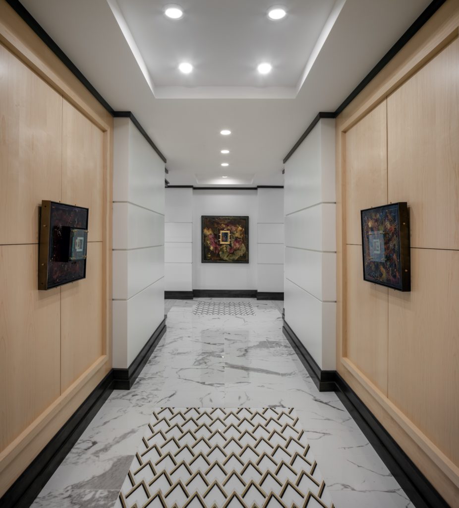 Beautiful paneling and lavish marble flooring belie the fact that this is a doctor's office. It's the MD2 format for medical clinics nationwide.