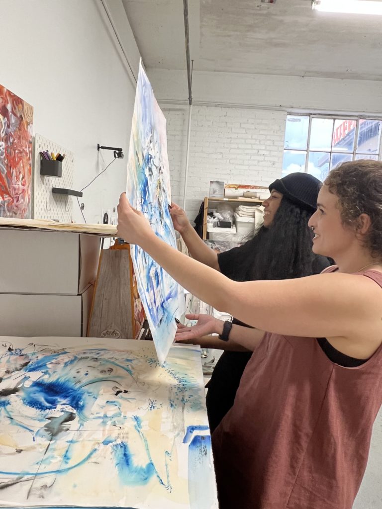 Artist Erika Alonso, curator/art adviser Moriah Alise in Alonso's Winter Street studio, days before the fire. (Photo by CDA)   