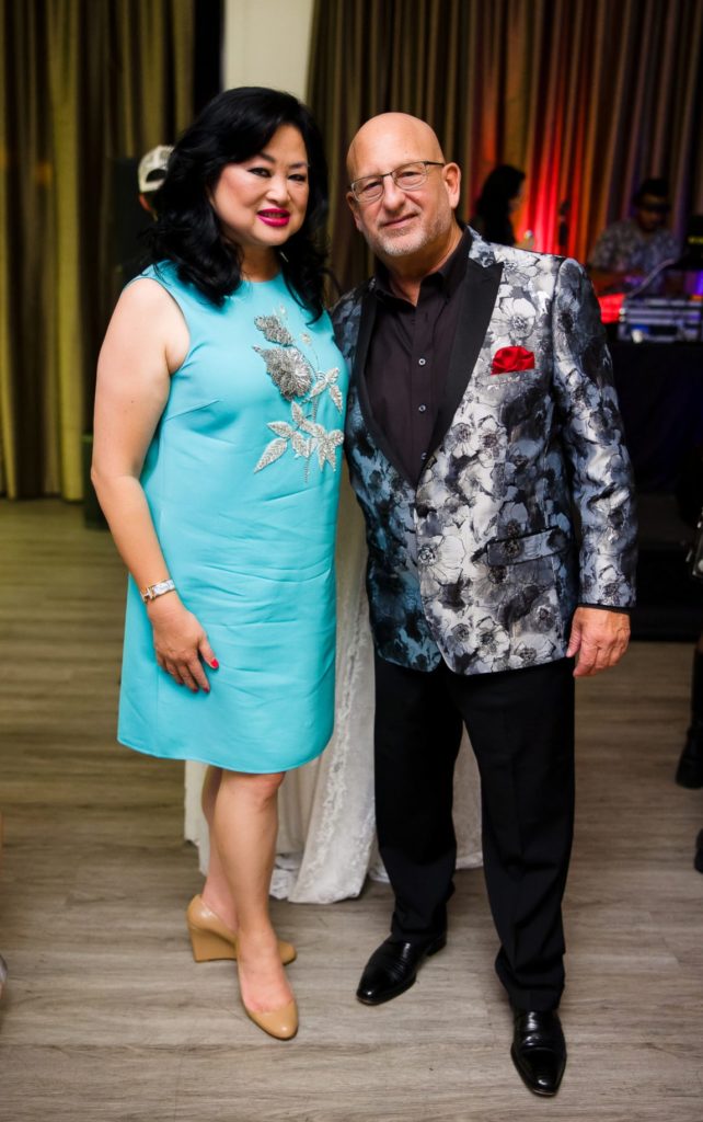 Gigi Huang, Brian Brewer at Construction Concepts Holiday Party for a Cause (Photo by Hung L. Truong Photography)