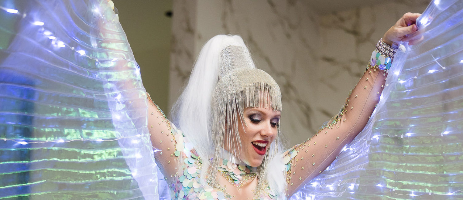 The 12-foot tall Ice Queen entertaining at Construction Concepts Holiday Party for a Cause (Photo by Hung L. Truong Photography)