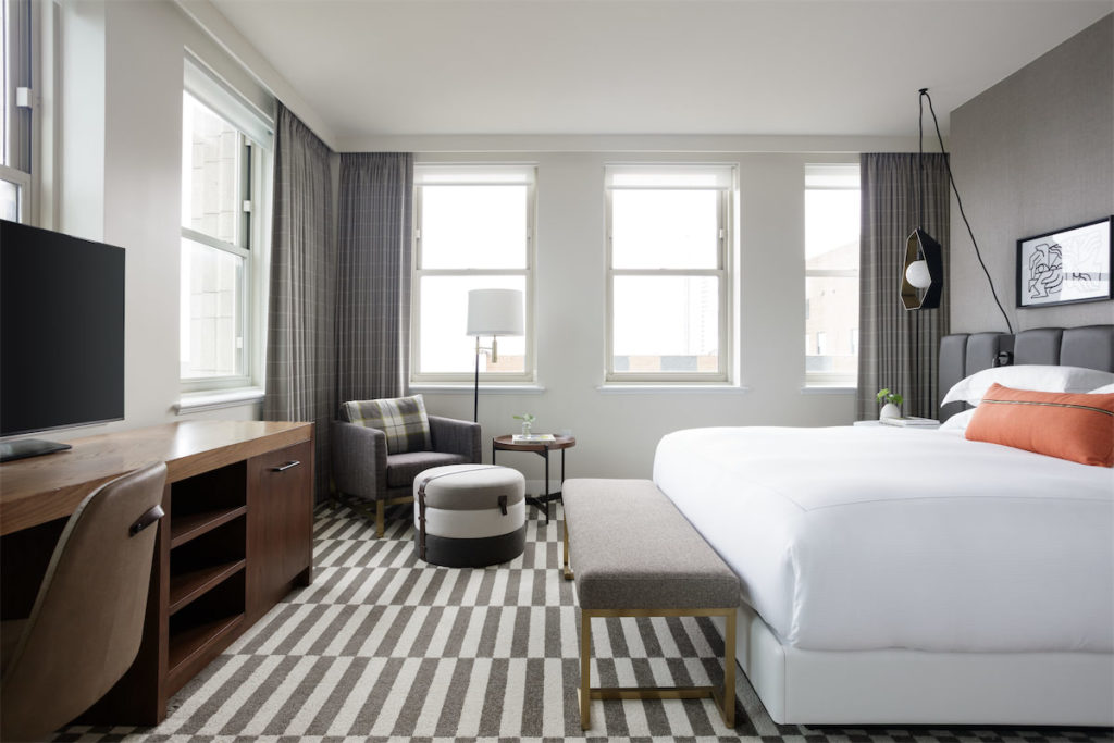 King suites at Kimpton Harper come with a spacious living room and bedroom.