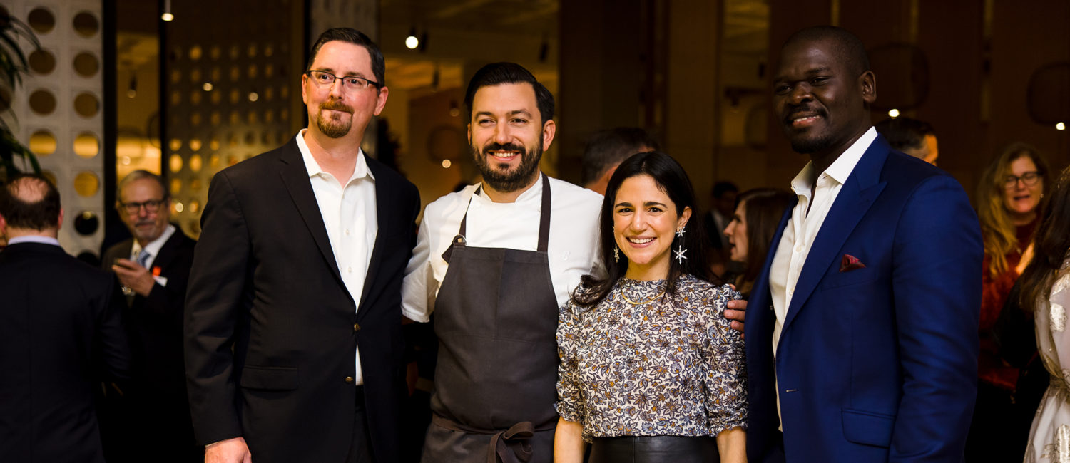 Texas Children's Hospital's Mark Putnam, chef Aaron Bludorn, Victoria Pappas Bludorn, Cherif Mbodj at the Texas Children's Hospital Ambassadors Holiday Party held at Navy Blue in Rice Village (Photo by Jenny Antill Photography)