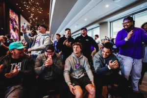 Max Duggan surrounded by team mates the moment it was announced that he was one of four Heisman Trophy finalists.