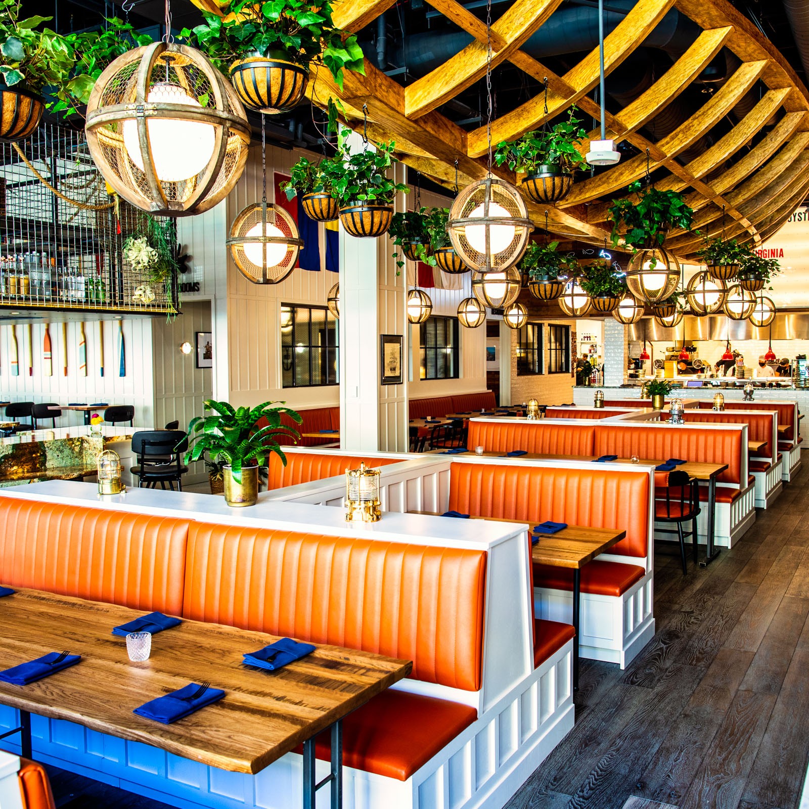 Plank Seafood Provisions dining room inside The Domain Austin is a colorful place.