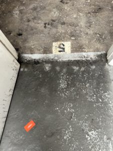 Soot blackens the floor of Sandi Seltzer Bryant’s studio. (Courtesy the artist