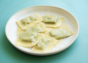 House-made spinach ravioli en Bianco is tossed in melted butter with Reggiano cheese at the new Louie's Italian American. (Photo by Photography courtesy of Lindsey Cooper-Trevino and Sergio Trevino )