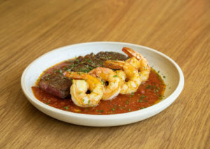 Steak and Shrimp Fra Diavolo made with wagyu New York strip steak and Gulf Coast shrimp is on Louie's Italian American menu. Photo by Lindsey Cooper-Trevino and Sergio Trevino.