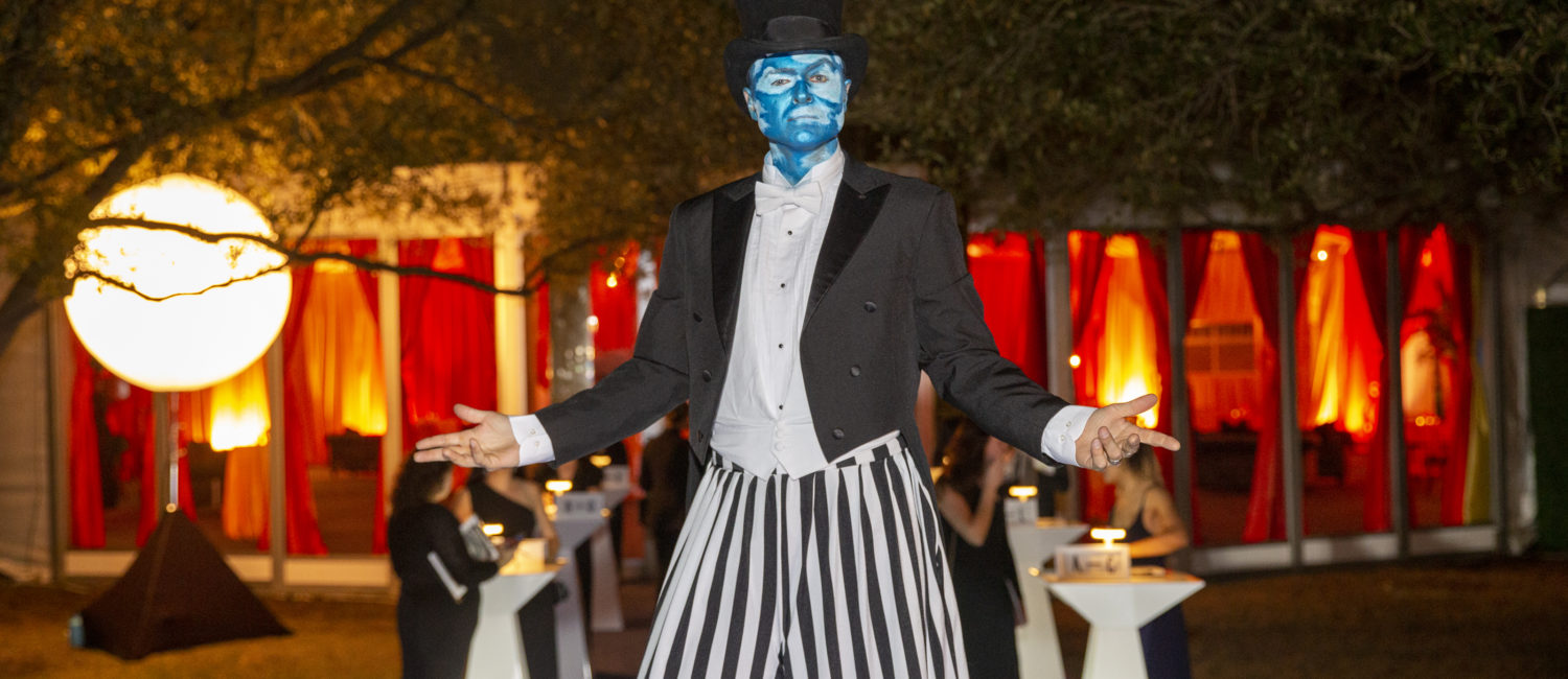 Stilt walker welcoming guests to Cirque Surréaliste. Photo by Jenny Antill