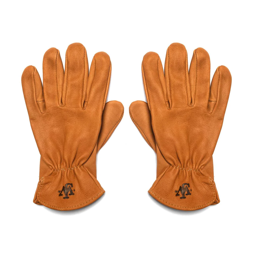 https://www.papercitymag.com/wp-content/uploads/2022/12/Wayne-JW-branded-deerskin-gloves-are-built-to-last.webp