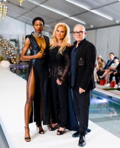 A model in Cesar Galindo, hostess Theresa Roemer, designer Cesar Galindo at the Fashion Woodlands (Photo by Hung Truong Photography)