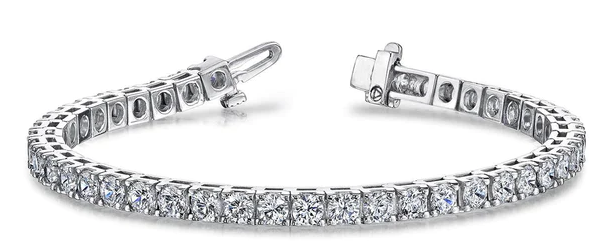 18K white gold rhodium plated diamond straightline bracelet with 52 round diamonds weighing approximately 6.64 carats total weight; $11,000