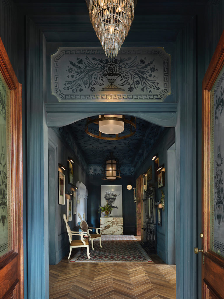 Moody hues and a dramatic mix of materials in the Grand Hall of The Madrona. (photo by Matthew Millman)
