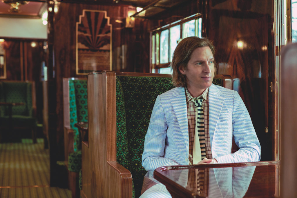 Wes Anderson in the British Pullman carriage he designed.