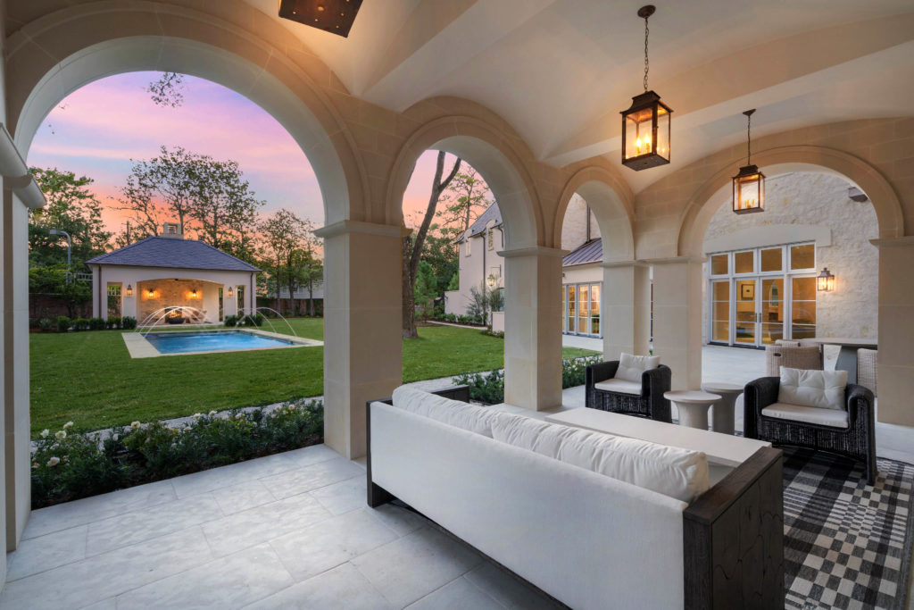 Al fresco entertaining offers garden views from the loggia located off of the main salon at 2445 Pine Valley Court. (Photo by Sonya Bertolino)