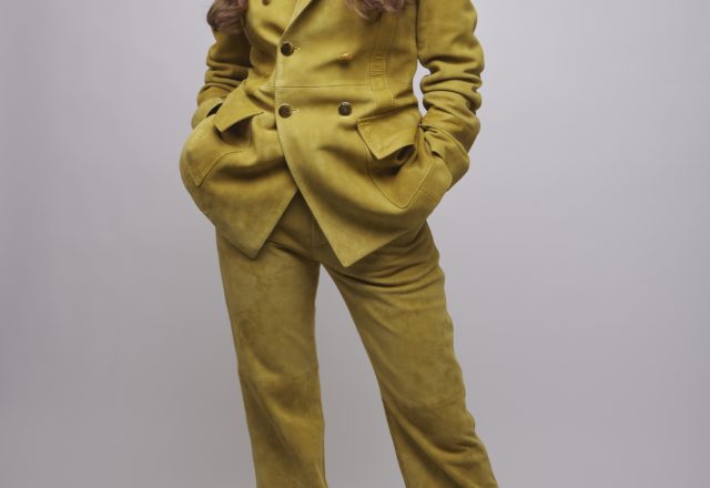 Bela Cooley is wearing Gucci and Eiseman Jewels.