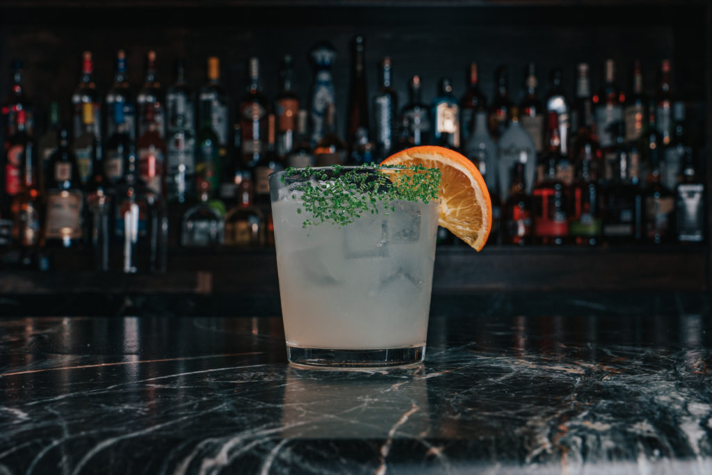 Mixologist Jessica Wells is behind the bar crafting cocktails from the everyday to the out of the ordinary.  (Photo by Raydon Creative)