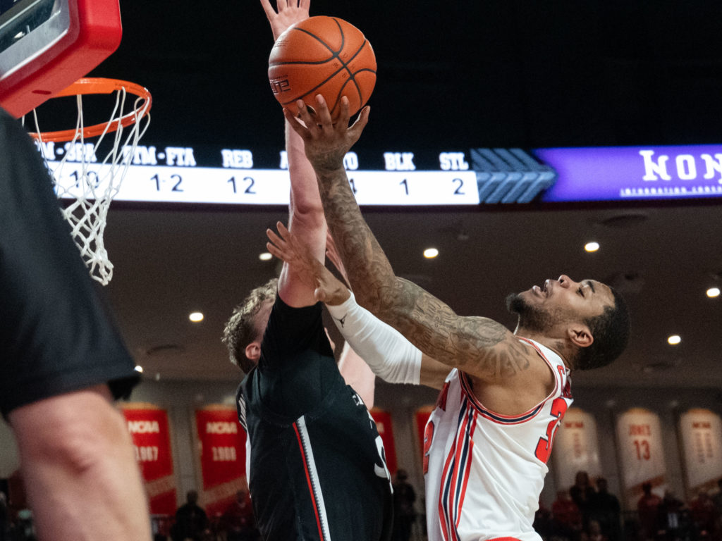 UH senior forward Reggie Chaney plays a bruising style of basketball. (Photo by F. Carter Smith)