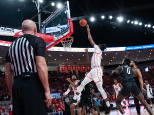 The University of Houston Cougars beat the University of Central Florida Knights with a 71-65 victory at Fertitta Center