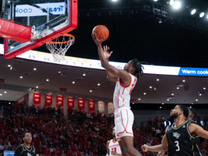 The University of Houston Cougars beat the University of Central Florida Knights with a 71-65 victory at Fertitta Center