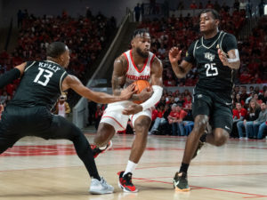 The University of Houston Cougars beat the University of Central Florida Knights with a 71-65 victory at Fertitta Center
