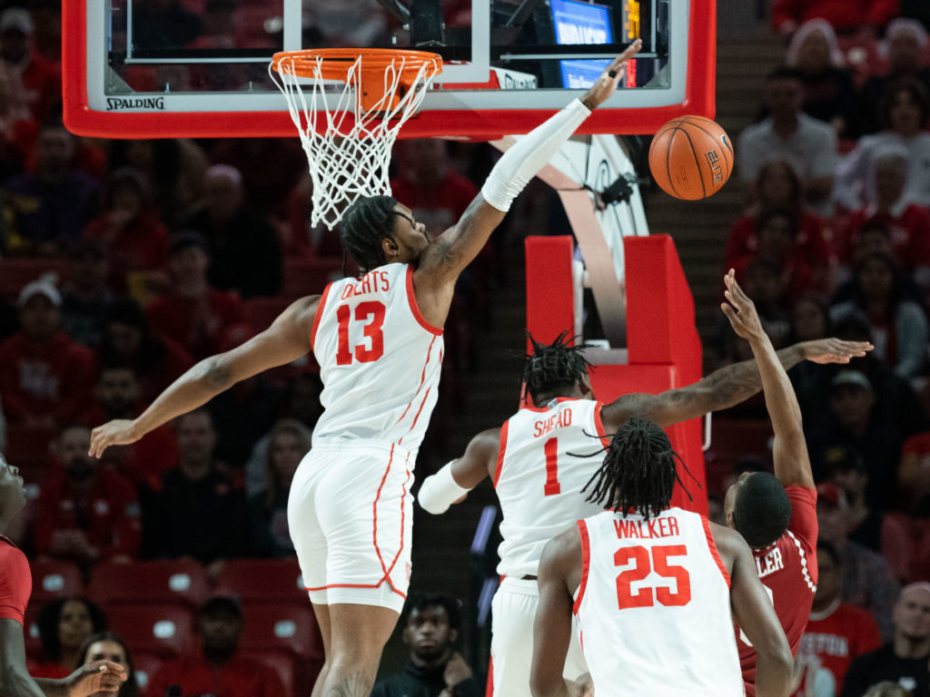 University of Houston forward J'Wan Roberts, Jamal Shead and the Coogs set imposing defensive standards. (Photo by F. Carter Smith)