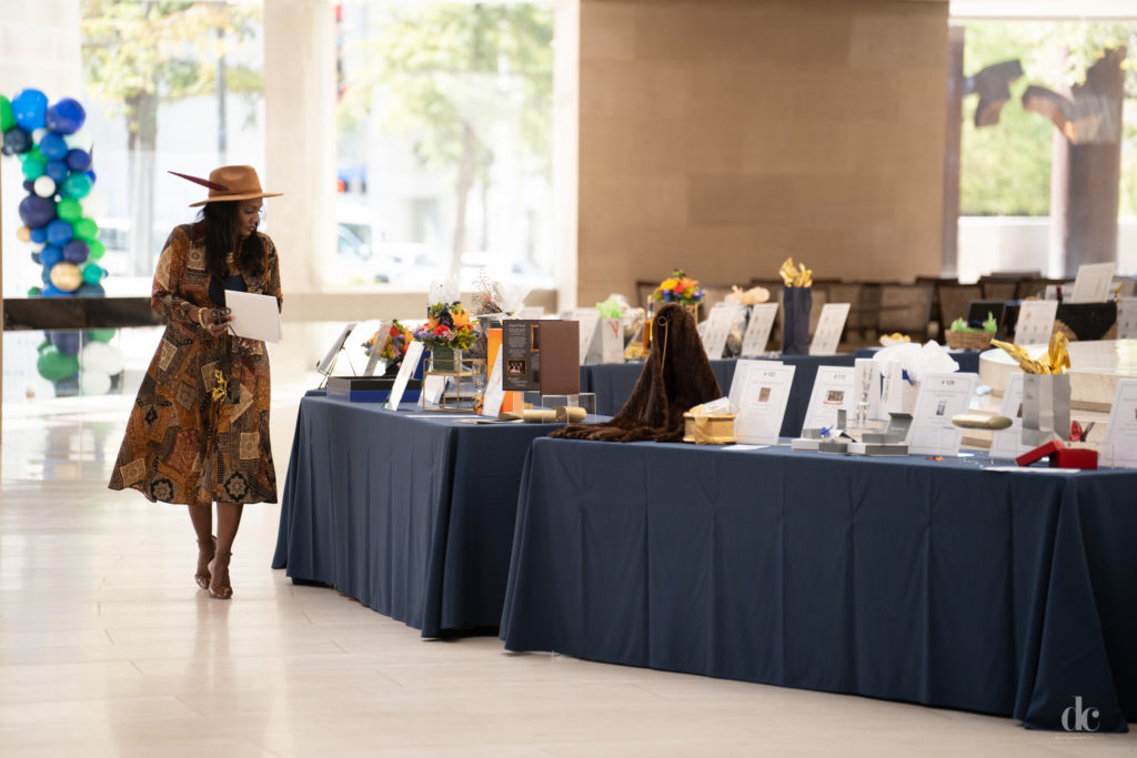 Kimberly Elliott at the silent auction (Photo by Danny Campbell, Thomas Garza, Rob Wythe/Wythe Portrait Studio)