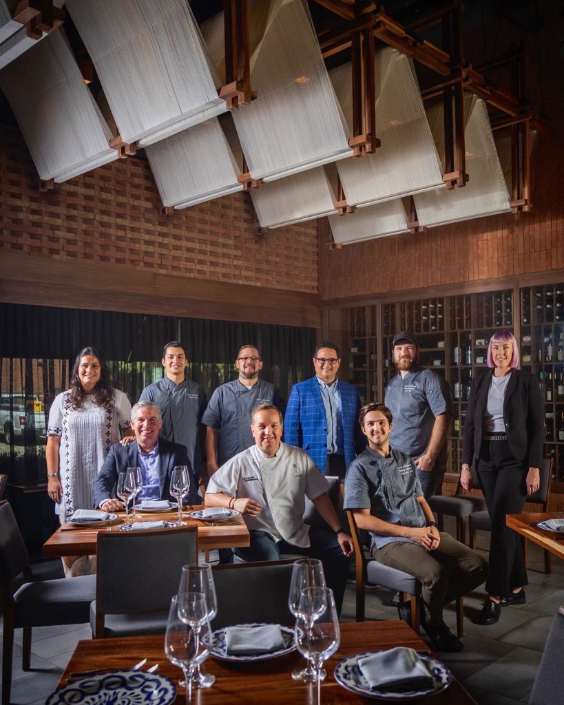 The Don Artemio team with Adrian Burciaga, Juan Ramón Cárdenas Cantú, and Rodrigo Cantú on the front row.