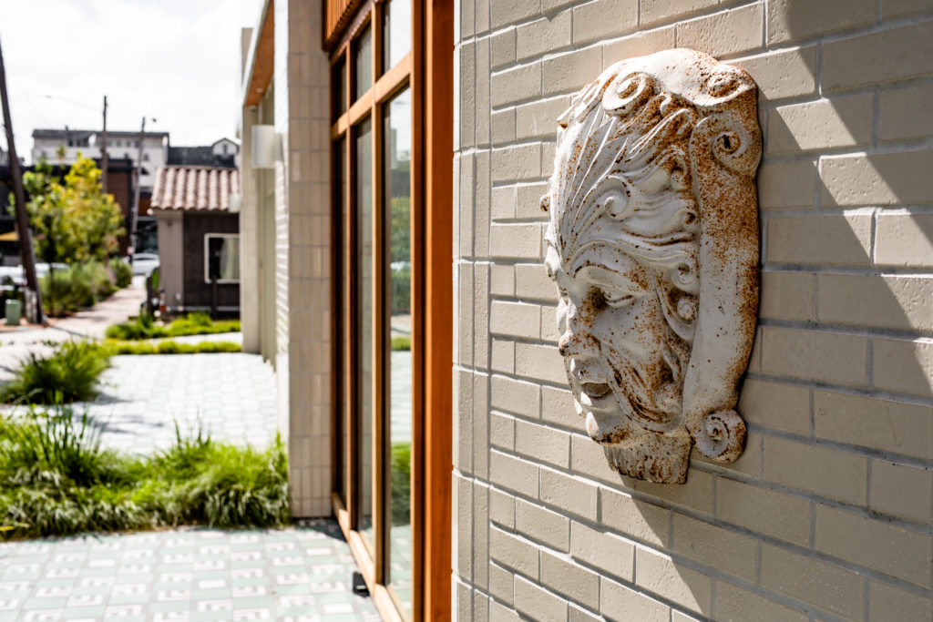 The new Montrose area restaurant, Graffiti Raw was created by The Big Vibe Group. Their talisman is "the raw man" pictured here. (Photo by Kirsten Gilliam)