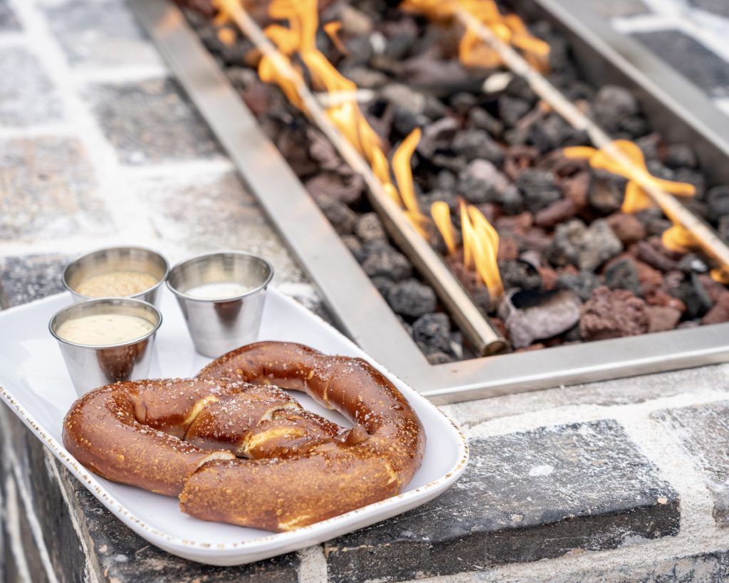 Corporate chef Teddy Lopez has created a menu with a focus on smoked meats and beer friendly fare like these house-made pretzels. (Photo by Dustyn Zenner)