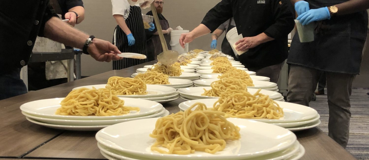 A view of the kitchen at last year’s Chefs for Paws event. Collaborating chefs work to put out a memorable multi-course meal.