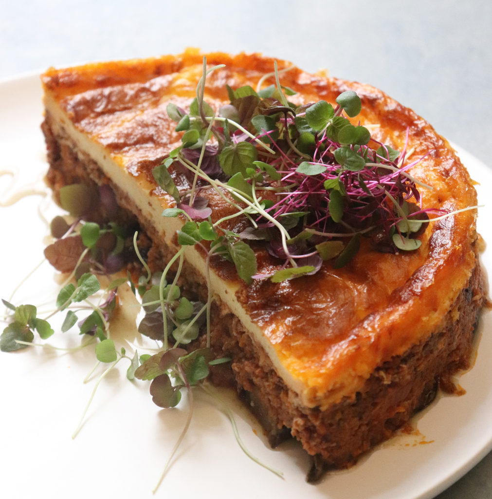 Heat and eat meals to go include the traditional Moussaka, a Greek casserole made with eggplant, beef and a creamy bechamel. (Photo by Ajna Jai)