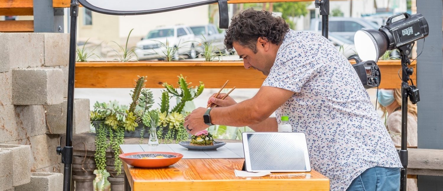 Chef Lanny Lancarte makes sure his Righteous Foods is photo ready. Righteous Food is one of Fort Worth’s Best Vegan Restaurants.