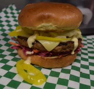 Vegan – It’s Food Food Truck filled with crispy fried tofu burger.