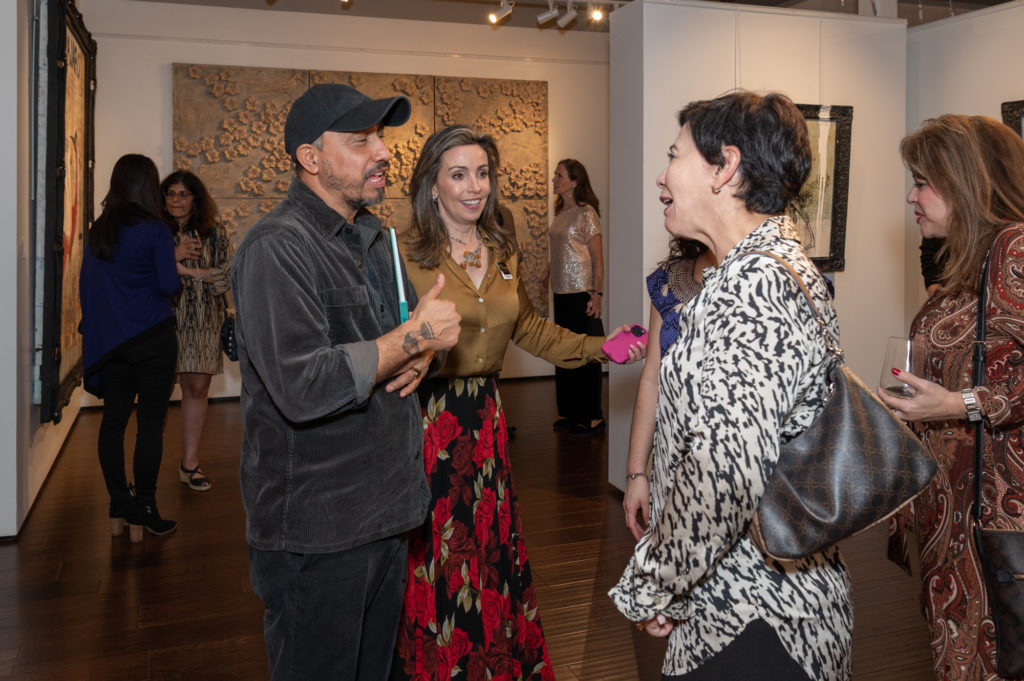 Oaxacan Contemporary Artist Amador Montes celebrates solo debut with Art of the World Gallery Co-Founder, Liliana Molina at "Under the Skin" exhibition (Photo by Paul R. Davis)
