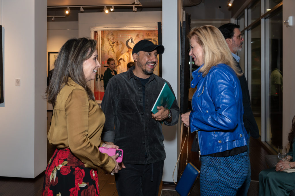 Oaxacan Contemporary Artist Amador Montes celebrates solo debut with Art of the World Gallery Co-Founder, Liliana Molina at "Under the Skin" exhibition;  Photo Credit: Paul R. Davis 
